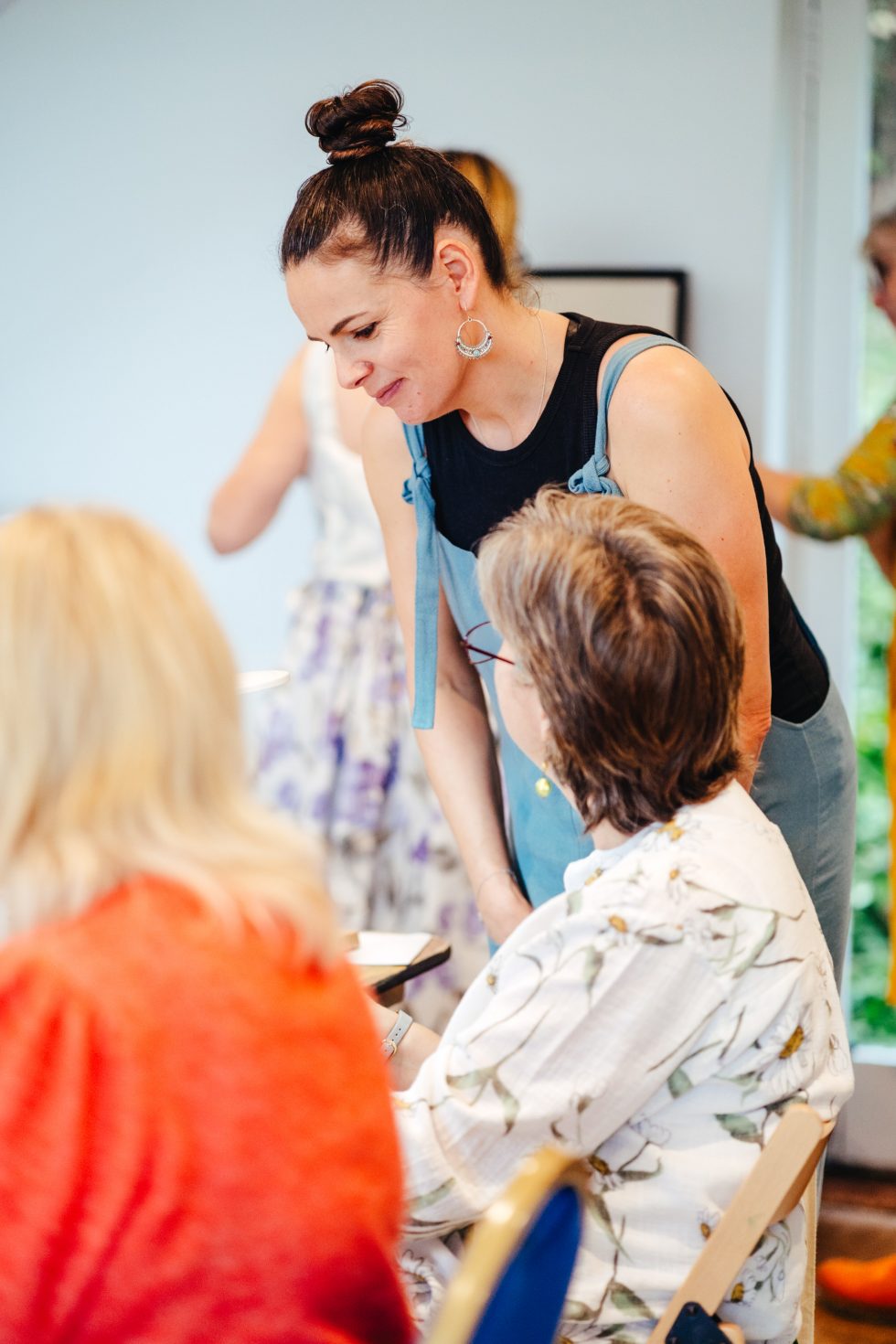 Ladies talking at a Gathered Threads Sewing retreat